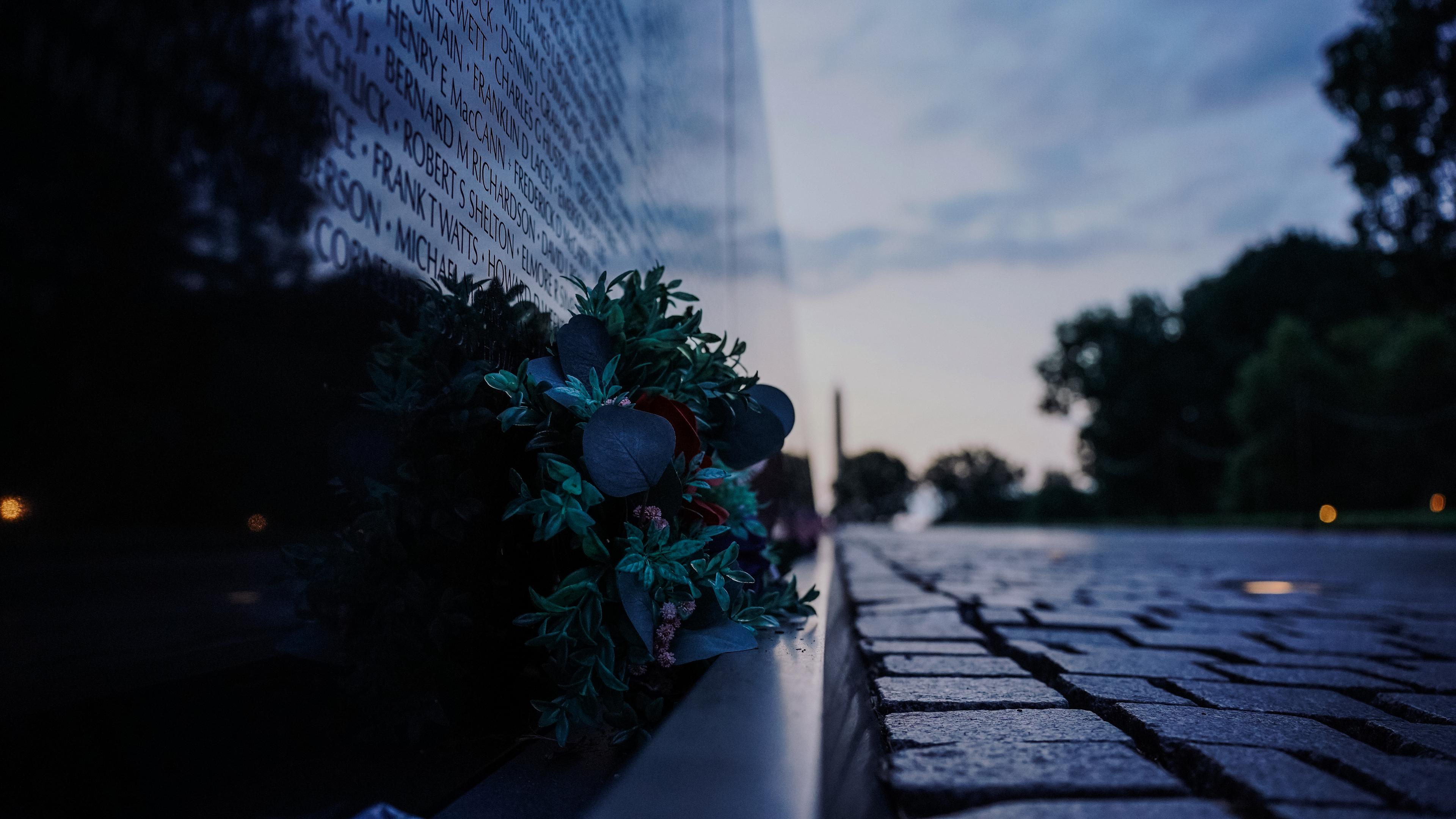 Flowers left at the Memorial Wall